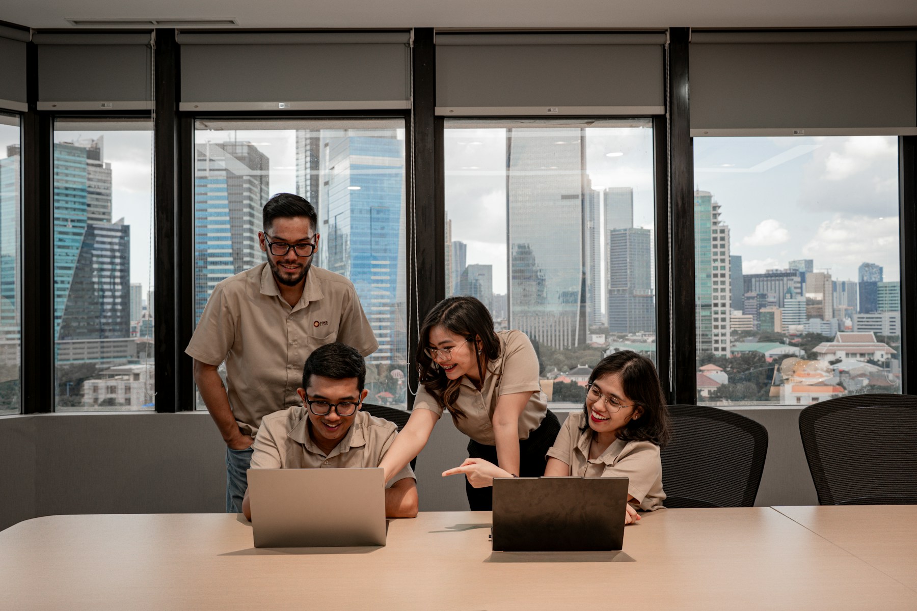 IT team collaborating in a modern office
